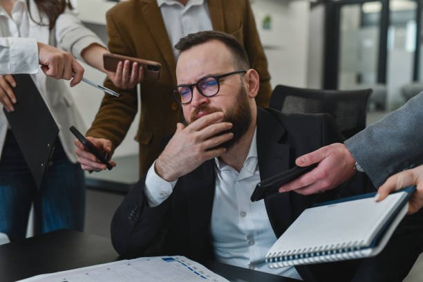 Business owner reviewing financial reports to improve financial visibility and confidence during business growth | Molinari Oswald CPAs & Business Advisors