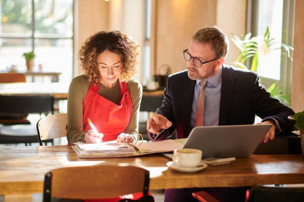 Business owner reviewing year-round tax planning and financial strategy with a CPA | Molinari Oswald CPAs & Business Advisors